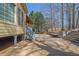 Charming backyard featuring a stone patio and stairway, offering a private and peaceful outdoor space at 1621 Telfair Chase Way, Lawrenceville, GA 30043