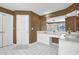 Bathroom with a large vanity, tiled floor, and a glass enclosed shower at 1621 Telfair Chase Way, Lawrenceville, GA 30043