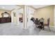 Basement living area featuring seating and dining spaces with neutral-toned walls at 1621 Telfair Chase Way, Lawrenceville, GA 30043