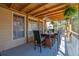 Covered patio with an outdoor bar and seating, perfect for relaxing or entertaining at 1621 Telfair Chase Way, Lawrenceville, GA 30043