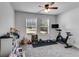 Spacious bedroom features large windows, a ceiling fan, and is brightly lit at 245 Raleigh Way, Villa Rica, GA 30180