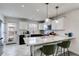 Well-lit kitchen with quartz countertops, modern backsplash, and stainless steel appliances at 245 Raleigh Way, Villa Rica, GA 30180