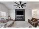 Cozy living room showcasing a fireplace, large television, and comfortable seating arrangement at 245 Raleigh Way, Villa Rica, GA 30180