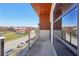 This modern balcony boasts sleek glass railings and an open view of the neighborhood at 472 Martin Se St # 1, Atlanta, GA 30312