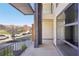Modern balcony showcasing sleek metal railings and an open view of the surrounding neighborhood at 472 Martin Se St # 1, Atlanta, GA 30312