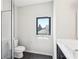 Modern bathroom with a glass enclosed shower and vanity sink at 472 Martin Se St # 1, Atlanta, GA 30312
