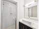 Modern bathroom featuring a glass shower and rectangular sink with modern fixtures and clean, white subway tile at 472 Martin Se St # 1, Atlanta, GA 30312
