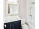 Modern bathroom with a tub, shower head, and vanity sink at 472 Martin Se St # 1, Atlanta, GA 30312