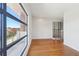 Bedroom featuring hardwood floors and large windows with views at 472 Martin Se St # 1, Atlanta, GA 30312