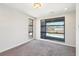 A carpeted bedroom with natural light from multiple windows, offers serene views and a calming atmosphere at 472 Martin Se St # 1, Atlanta, GA 30312