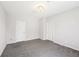 A basic carpeted bedroom features neutral walls, a bright window, and essential fixtures for comfortable living at 472 Martin Se St # 1, Atlanta, GA 30312