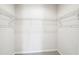 Walk-in closet with white wire shelving providing efficient storage and organization at 472 Martin Se St # 1, Atlanta, GA 30312