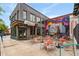 Exterior featuring Junior's Pizza, outdoor seating, and a vibrant mural on the side of the building at 472 Martin Se St # 1, Atlanta, GA 30312
