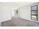 Modern hallway design featuring hardwood floors, a wooden handrail, and minimalist metal railings for a sleek look at 472 Martin Se St # 1, Atlanta, GA 30312