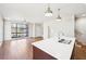 Modern open floorplan featuring a kitchen island and stainless steel appliances at 472 Martin Se St # 1, Atlanta, GA 30312