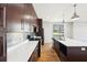 Modern kitchen with stainless steel appliances and an island for meal preparation and dining at 472 Martin Se St # 1, Atlanta, GA 30312