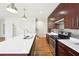 Modern kitchen with stainless steel appliances and an island for meal preparation at 472 Martin Se St # 1, Atlanta, GA 30312