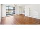 Bright living room with hardwood floors, large windows, and built-in shelving offering modern living at 472 Martin Se St # 1, Atlanta, GA 30312