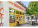 Street-level view of How Crispy Express featuring a yellow-framed storefront and signage at 472 Martin Se St # 1, Atlanta, GA 30312