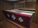 Retro basement bar with padded front and decorative details at 1404 Aniwaka Sw Ave, Atlanta, GA 30311
