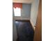 Simple bedroom featuring blue walls and dark carpet at 1404 Aniwaka Sw Ave, Atlanta, GA 30311