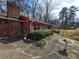 Exterior view with mature green shrubbery and a decorative birdbath at 1404 Aniwaka Sw Ave, Atlanta, GA 30311
