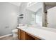 Bathroom featuring tiled floors, ample countertop space, and walk-in shower and jacuzzi tub at 2172 Creekview Trl, Decatur, GA 30035