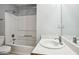 Bathroom with single vanity, tub and shower combo, and grey walls at 2172 Creekview Trl, Decatur, GA 30035