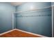 Walk in closet showcasing spacious storage and vinyl wood flooring at 2172 Creekview Trl, Decatur, GA 30035