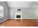 Bright living room with hardwood floors, fireplace, and vaulted ceilings at 2172 Creekview Trl, Decatur, GA 30035