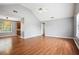 Bright living room featuring vaulted ceilings, hardwood floors, and a ceiling fan at 2172 Creekview Trl, Decatur, GA 30035