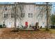The townhouse backyard features a patio set for outdoor dining and entertaining guests at 3302 Waldrop Trl, Decatur, GA 30034