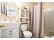Cozy bathroom with updated white vanity and cabinet providing ample storage at 3302 Waldrop Trl, Decatur, GA 30034