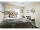 Inviting bedroom features a comfortable bed and dedicated workspace with a desk at 3302 Waldrop Trl, Decatur, GA 30034