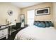 Bedroom featuring a full-length mirror and desk, ideal for creating a functional living space at 3302 Waldrop Trl, Decatur, GA 30034