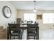 Spacious dining room with large glass table, ideal for Gathering gatherings at 3302 Waldrop Trl, Decatur, GA 30034