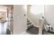Bright hallway leads to staircase and multiple rooms with neutral wall paint at 3302 Waldrop Trl, Decatur, GA 30034