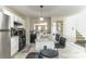Bright kitchen featuring stainless steel appliances, white cabinets and a kitchen island with bar seating at 3302 Waldrop Trl, Decatur, GA 30034