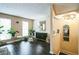 Well-lit living room with hardwood floors, decorative plants, and modern accents at 3302 Waldrop Trl, Decatur, GA 30034