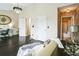 Spacious living room featuring hardwood floors, modern lighting, a decorative chandelier and ample natural light at 3302 Waldrop Trl, Decatur, GA 30034