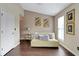 Living room features hardwood floors, modern decor, and natural light at 3302 Waldrop Trl, Decatur, GA 30034