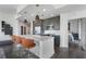 Modern kitchen with a quartz countertop island, sleek cabinets, stainless steel appliances, and stylish bar seating at 1080 Peachtree Ne St # 1610, Atlanta, GA 30309