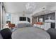 Open layout blending living, dining, and kitchen areas, with modern decor and lighting fixtures at 1080 Peachtree Ne St # 1610, Atlanta, GA 30309