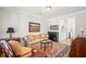 Cozy living room with neutral tones, featuring a decorative rug and comfortable seating at 1775 Unity Loop, Cumming, GA 30040