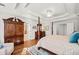 Luxurious main bedroom with tray ceilings, seating area, and decorative furniture at 1775 Unity Loop, Cumming, GA 30040