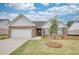 Beautiful brick home with a two-car garage and a well-manicured front lawn at 939 Park Place St, Social Circle, GA 30025