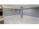 Large basement with tiled floor, bright lighting, and neutral colors awaits your personal touch at 1157 Helen St, Morrow, GA 30260