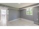 Room with natural light and adjacent space, offering versatile living options at 1157 Helen St, Morrow, GA 30260