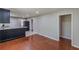 Dining area featuring hardwood floors and a seamless transition to the kitchen at 1157 Helen St, Morrow, GA 30260