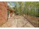 Wood deck in backyard with trees at 4367 S Berkeley Lake Nw Rd, Duluth, GA 30096